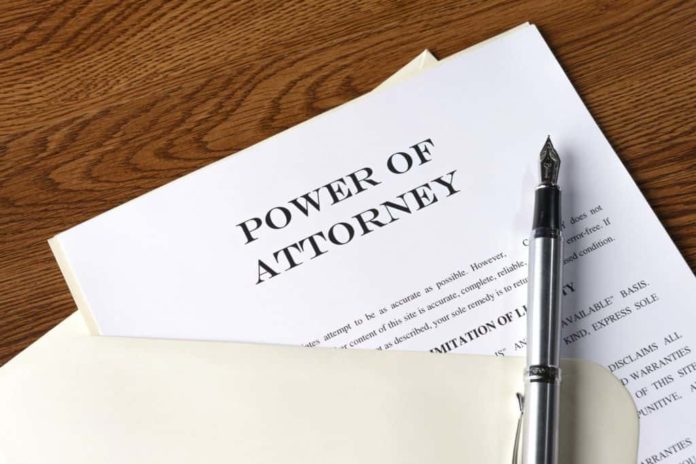 A power of attorney document being revised at Hammerle Finley Law Firm.