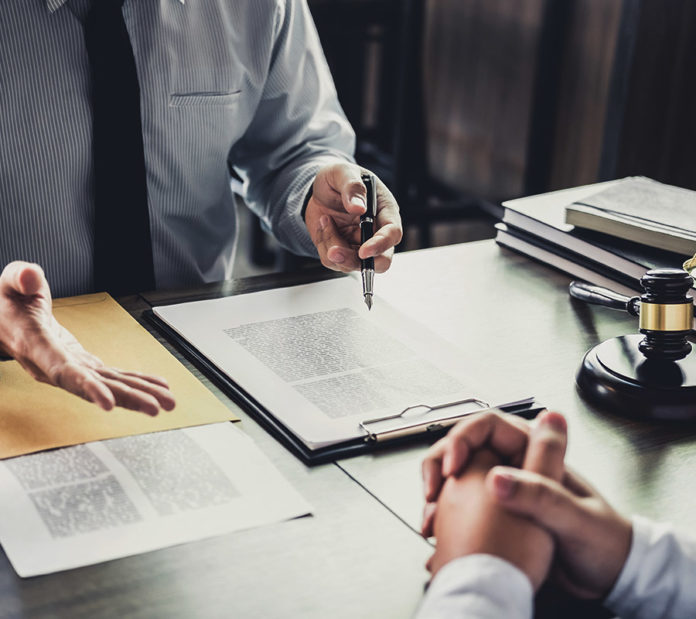 Will Force Majeure Provisions Excuse Performance in the COVID-19 Environment? Business lawyers speaking with his client.