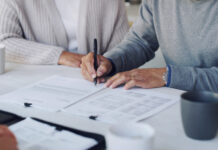 Precatory Words in Estate Planning: Why “I Wish” Can Fail Cropped shot of a senior couple meeting with a consultant to discuss paperwork at home