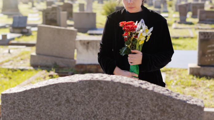 widow at grave