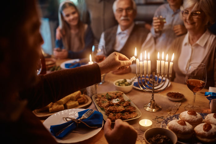 family celebrating Hanukkah