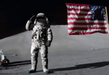 Astronaut on moon with American flag