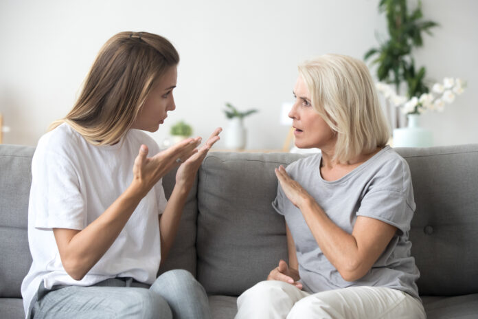 ladyhaving a conversation with an older woman