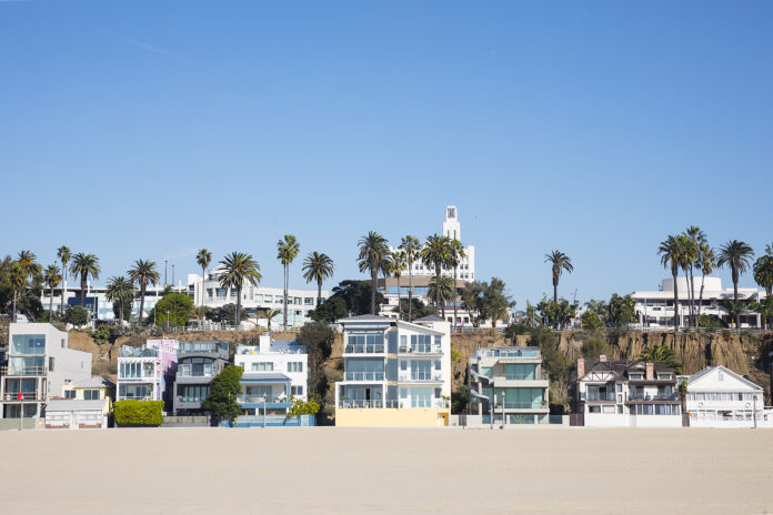 A view of Santa Monica beach houses along the coast.