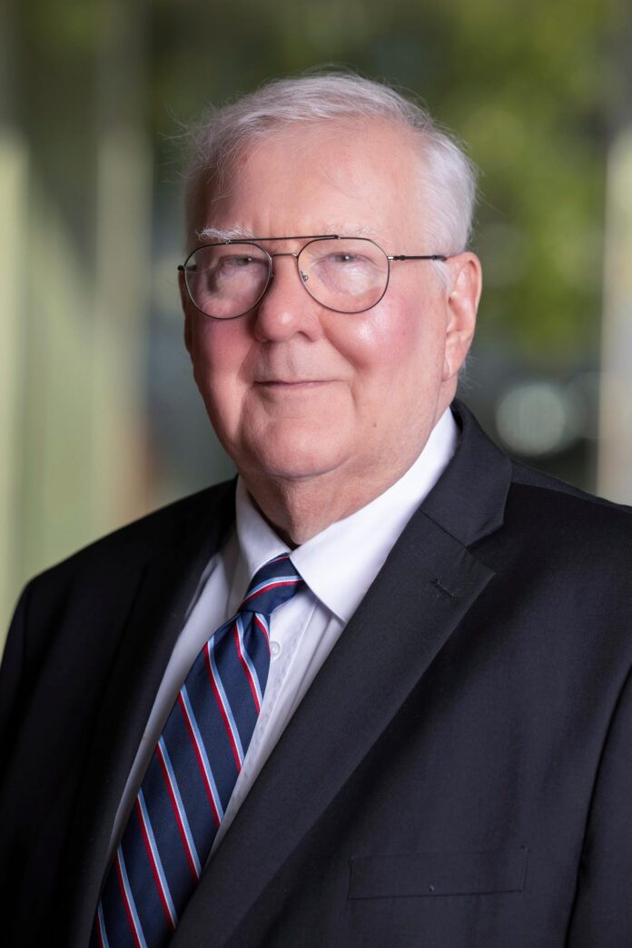 A headshot of Attorney Robert Morris.