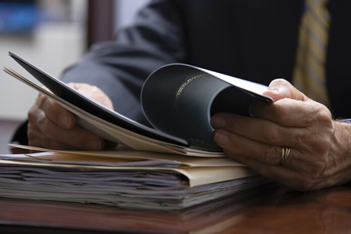 Businessman looking at paperwork